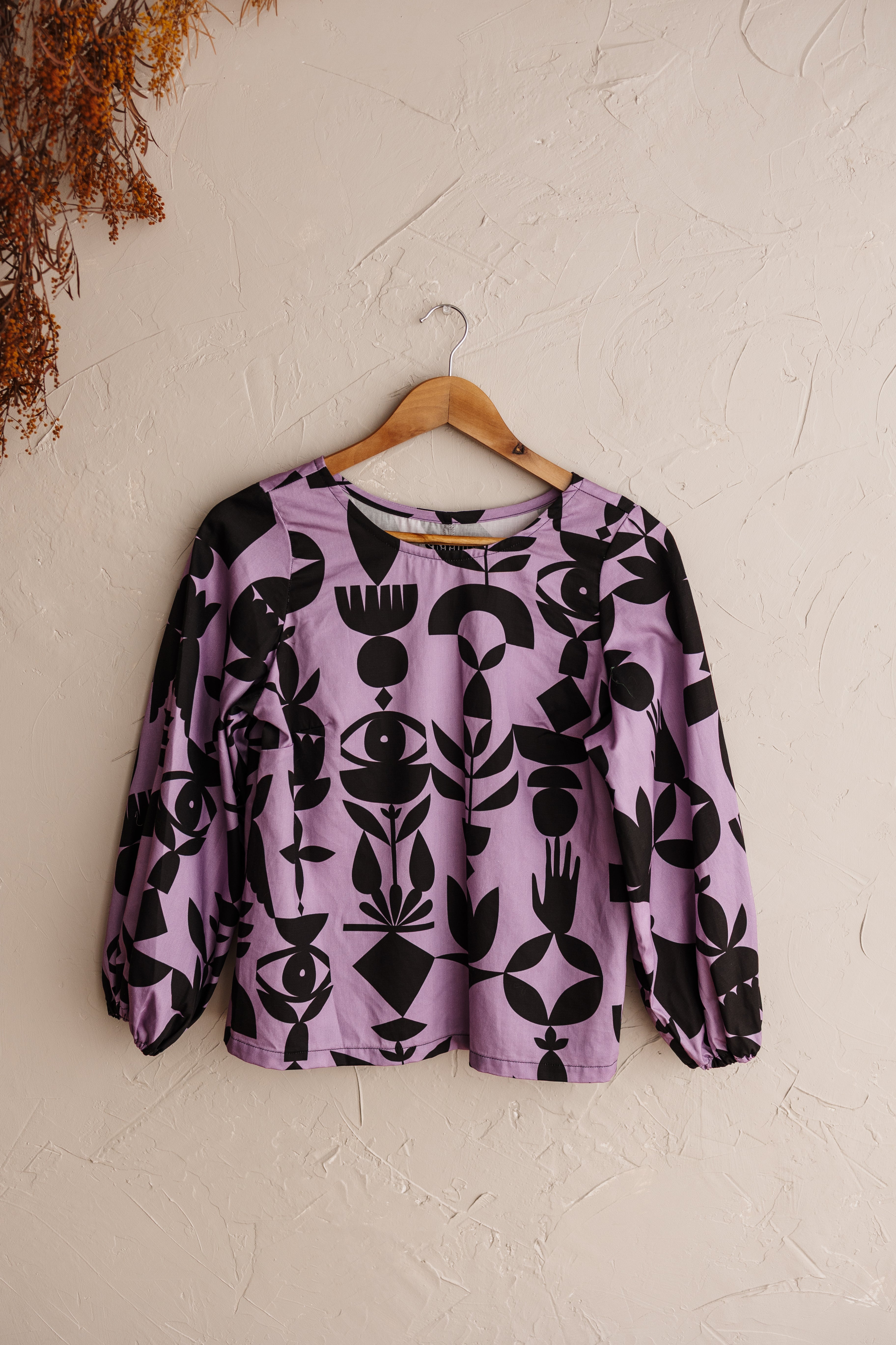 Statement balloon sleeves in lilac featuring the Memento print by Cecilia Mok. Made to order in organic cotton. Future Vintage by Spiritus Eco Clothing.