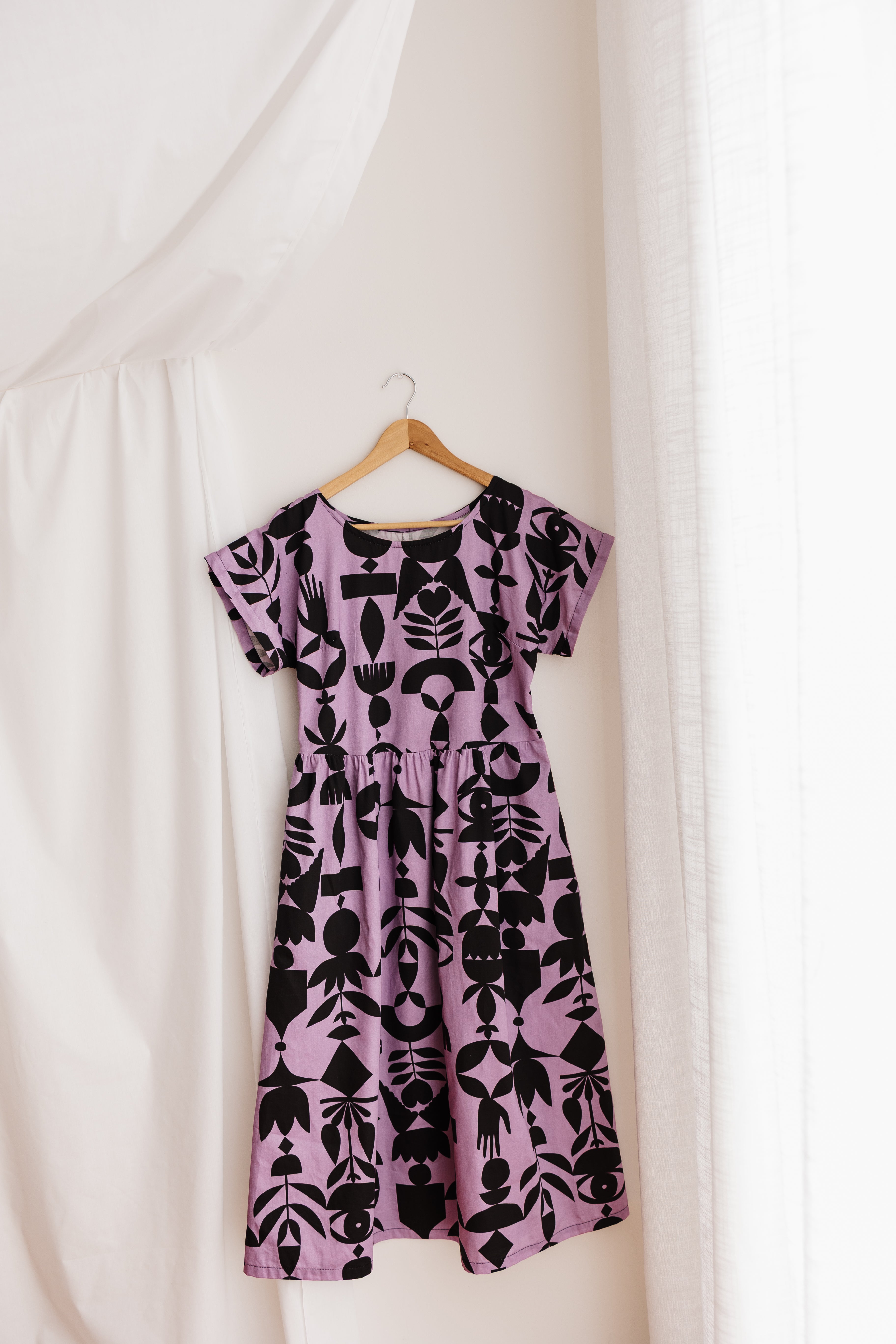 The Frankie Dress in lilac featuring the Memento print by Cecilia Mok. Made to order in organic cotton. Handmade slow fashion from the Dandenong Ranges.