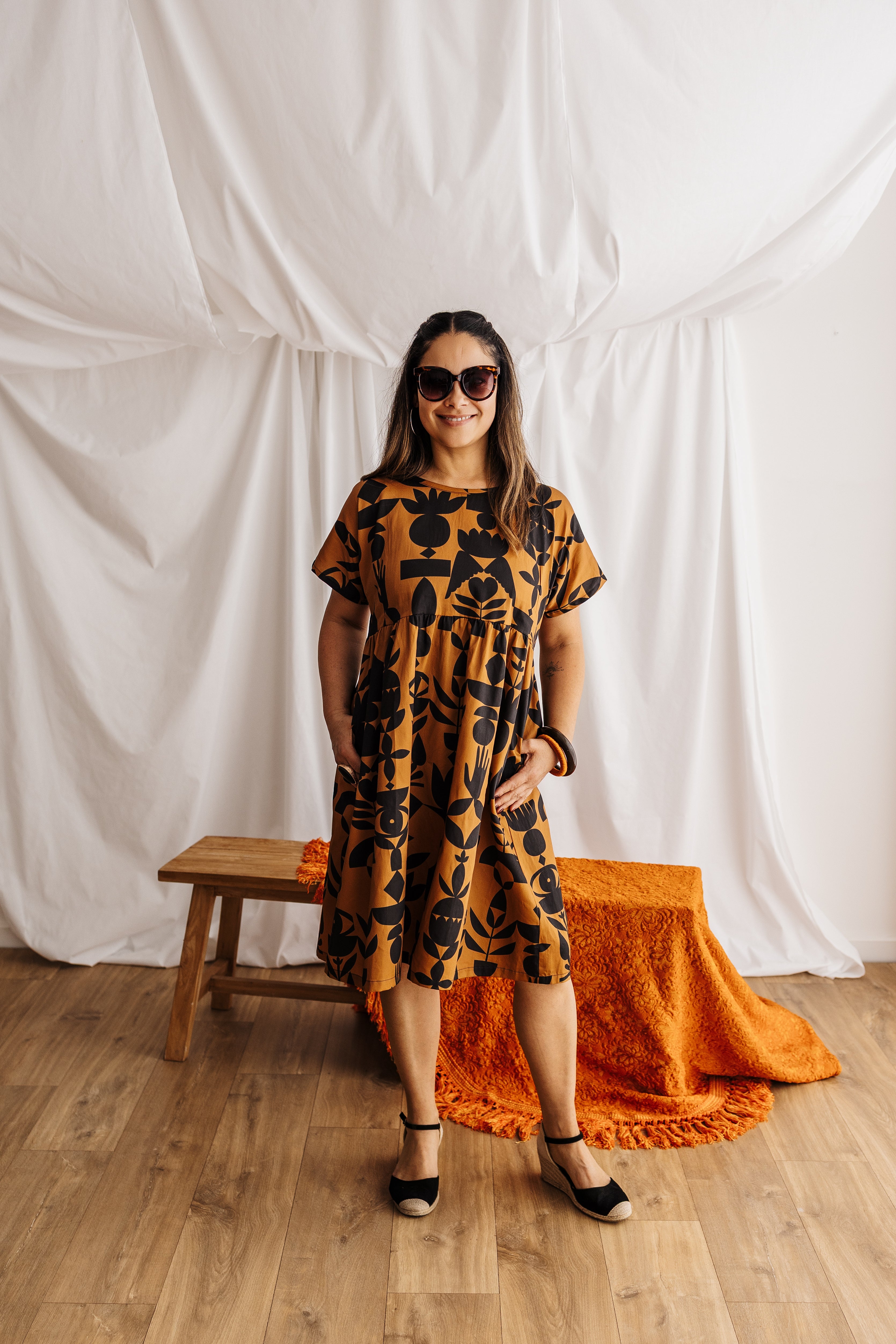 The Frida Dress in butterscotch featuring the Memento print by Cecilia Mok. Made to order in organic cotton. Handmade in the Dandenong Ranges, Australia.