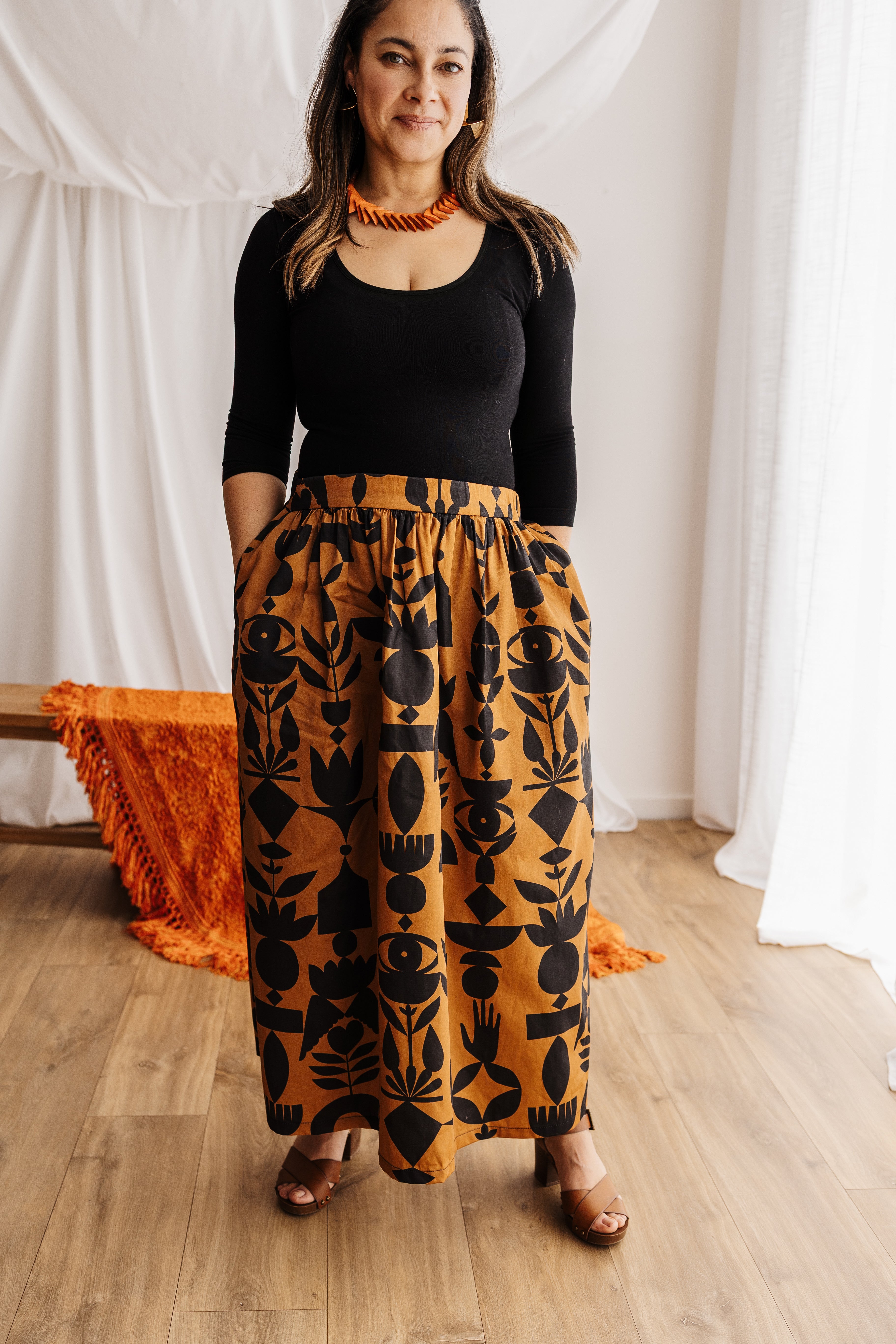 Flowing gypsy skirt in butterscotch featuring the Memento print by Cecilia Mok. Made to order in organic cotton. Handmade in the Dandenong Ranges, Australia.