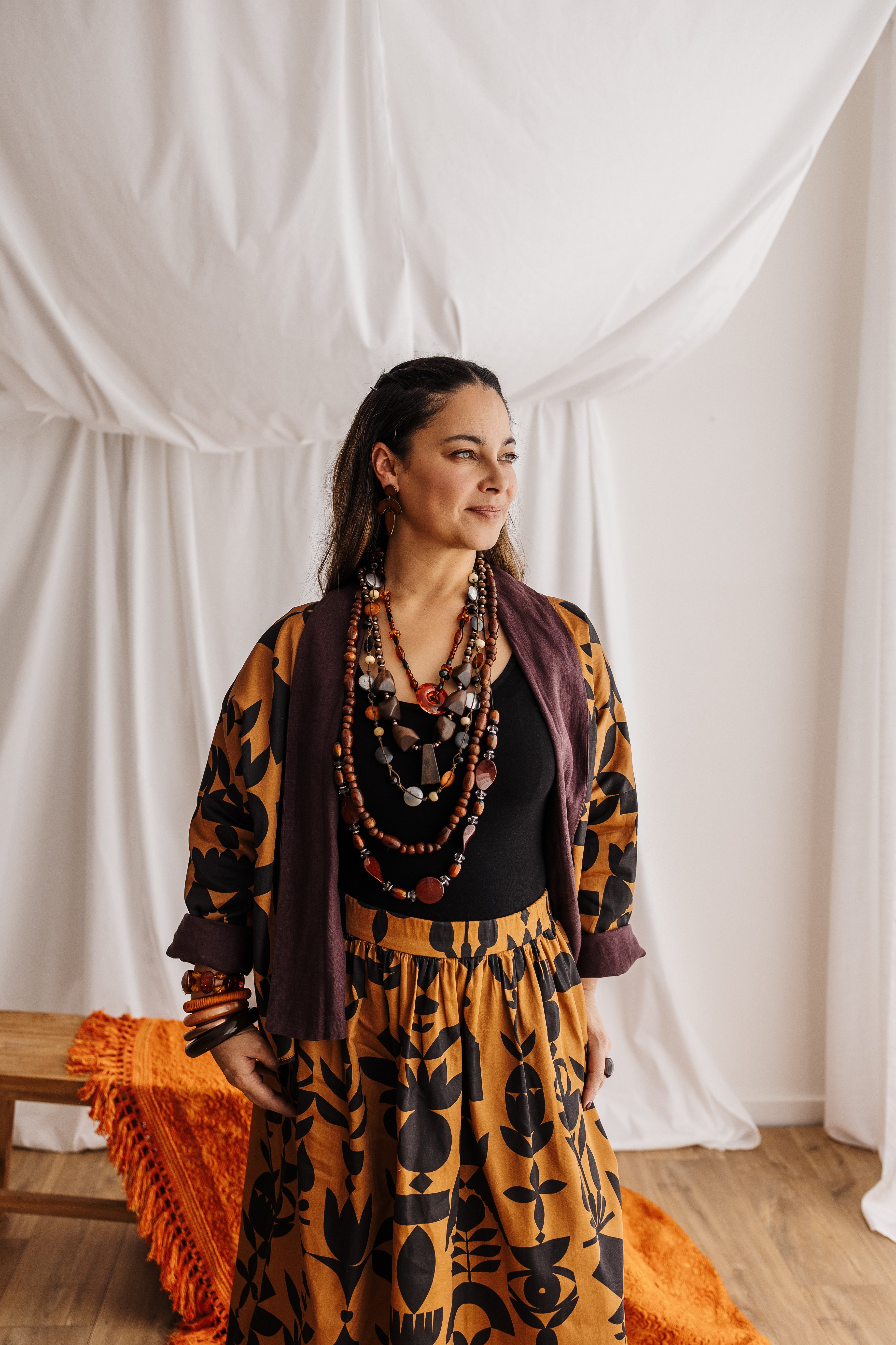 Flowing gypsy skirt in butterscotch featuring the Memento print by Cecilia Mok. Made to order in organic cotton. Handmade in the Dandenong Ranges, Australia.