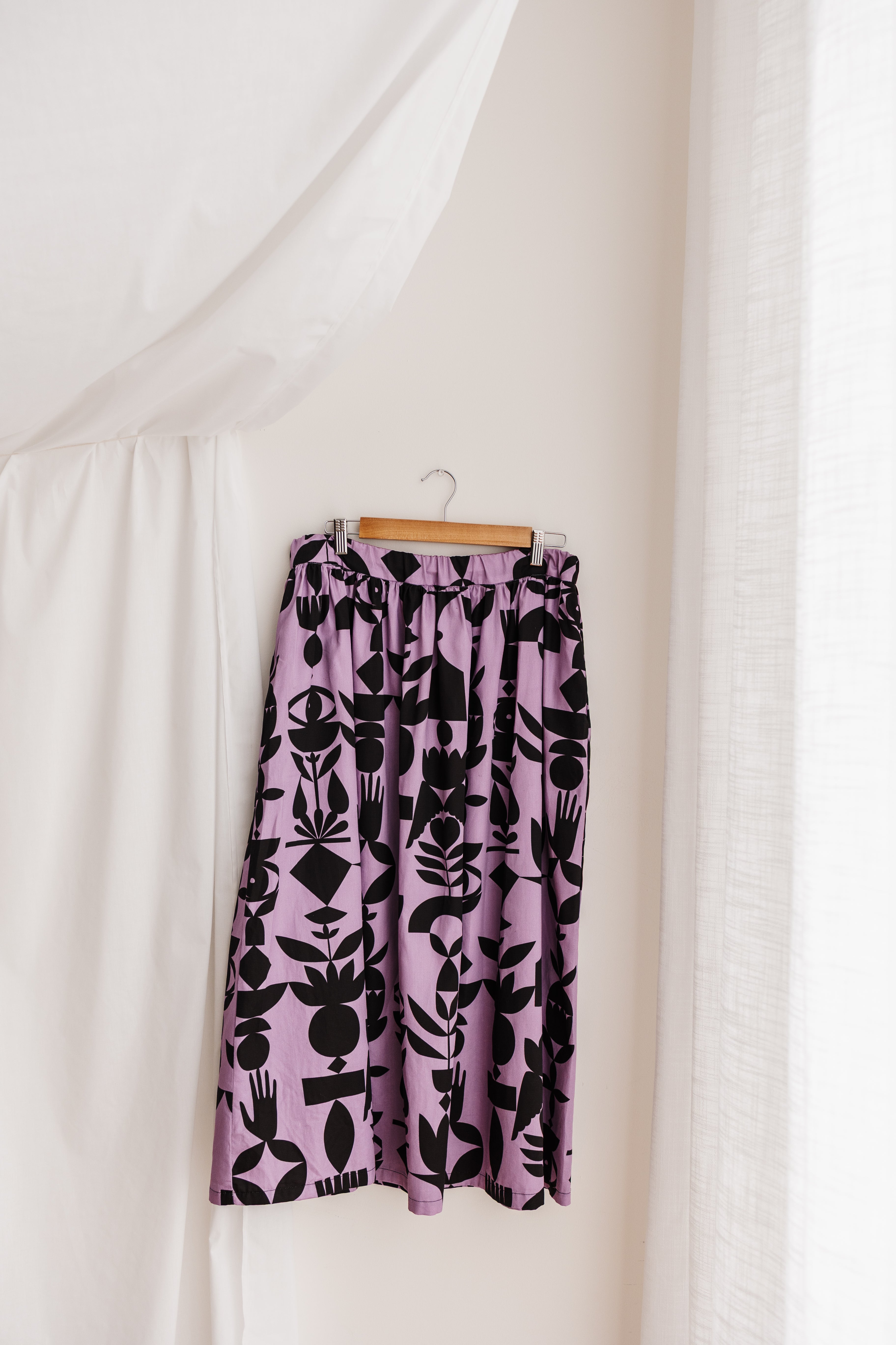  Flowing gypsy skirt in lilac featuring the Memento print by Cecilia Mok. Made to order in organic cotton. Handmade in the Dandenong Ranges, Australia.