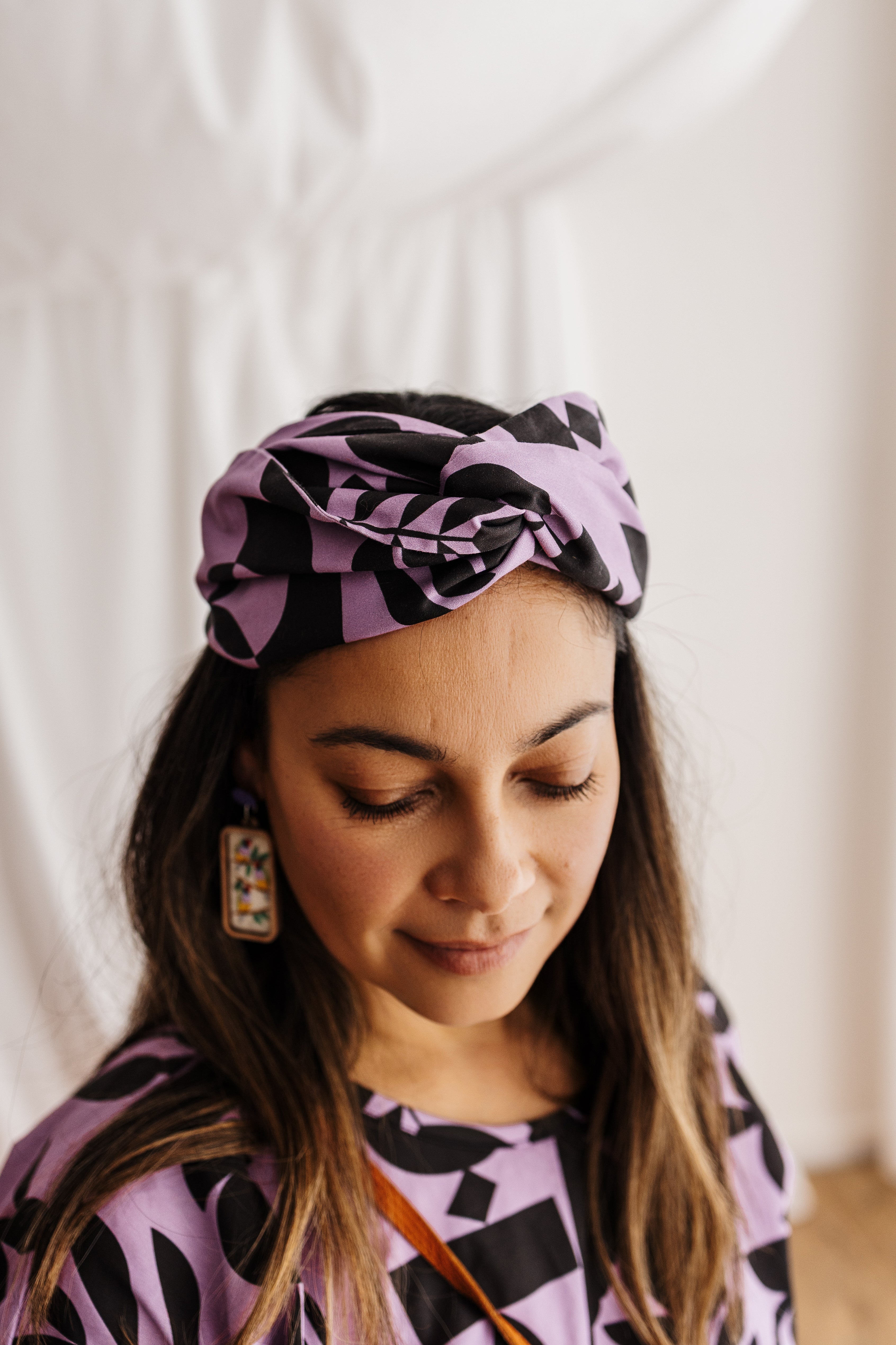 Handmade headband in lilac featuring the Memento print by Cecilia Mok. Made from organic cotton offcuts — zero waste Future Vintage by Spiritus Eco Clothing.