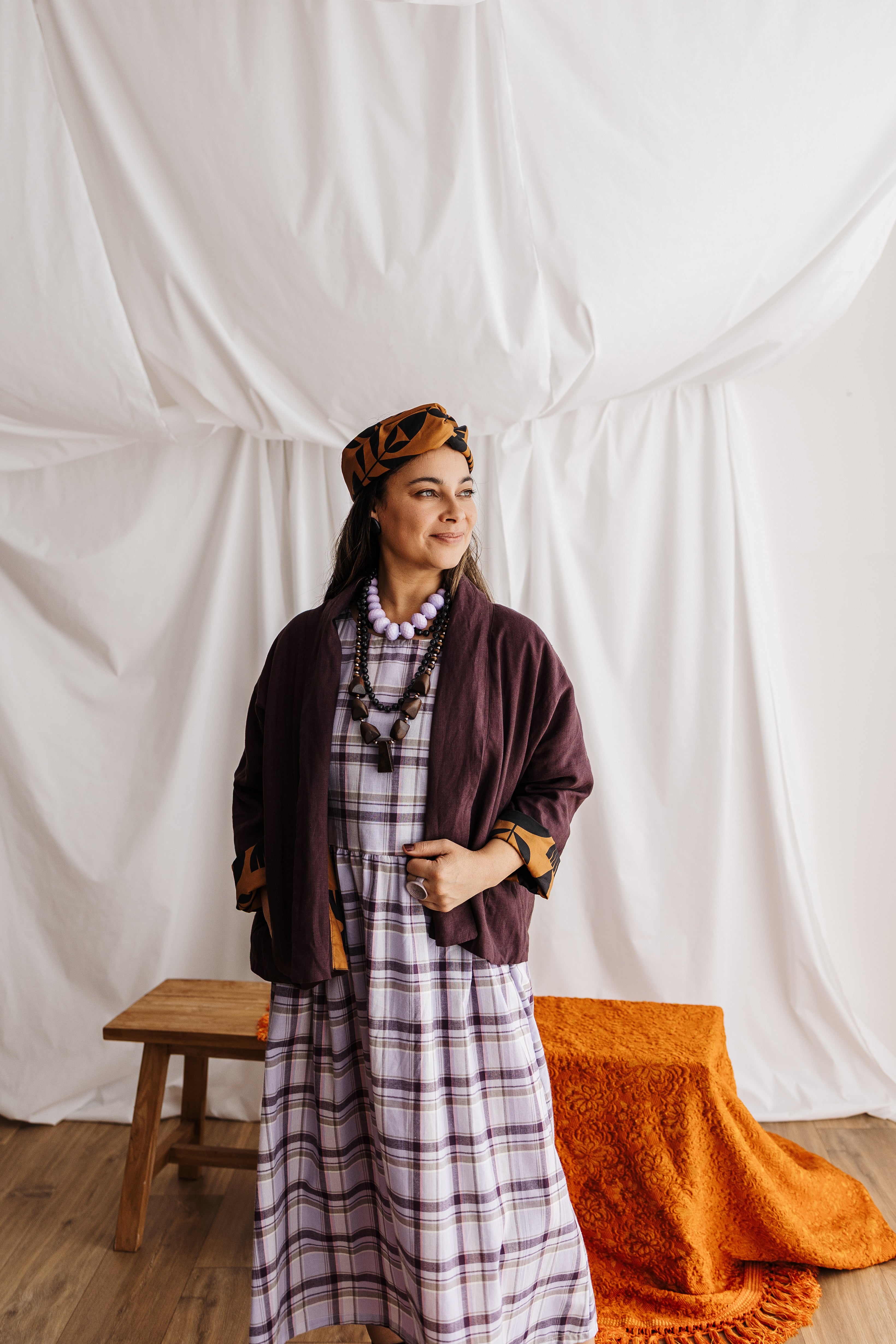 A reversible linen jacket — two looks in one. Butterscotch Memento print by Cecilia Mok and rich aubergine linen. Handmade in the Dandenong Ranges, Australia.