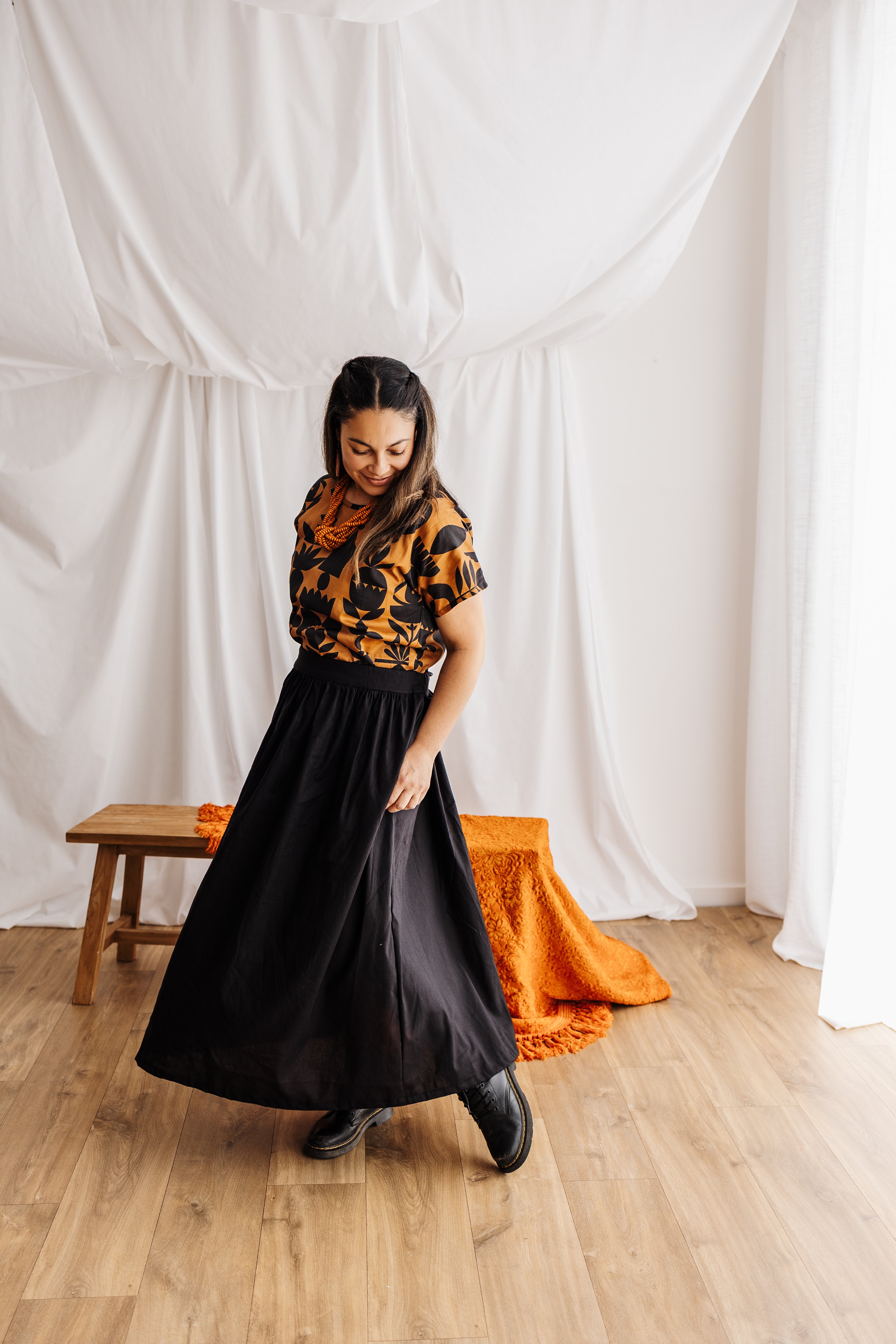 A relaxed tee in warm butterscotch featuring the Memento print by Cecilia Mok. Made to order in organic cotton. Future Vintage by Spiritus Eco Clothing.